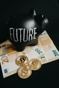 close up photo of black piggy bank on money